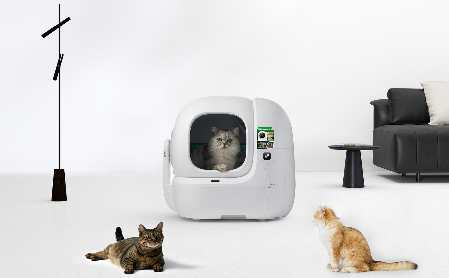 PETKIT Purobot Max Pro 2 automatic litter box with compact design blending into an apartment corner. Even in a multi-cat household, it delivers powerful odor control, maintaining a clean and fresh living environment.