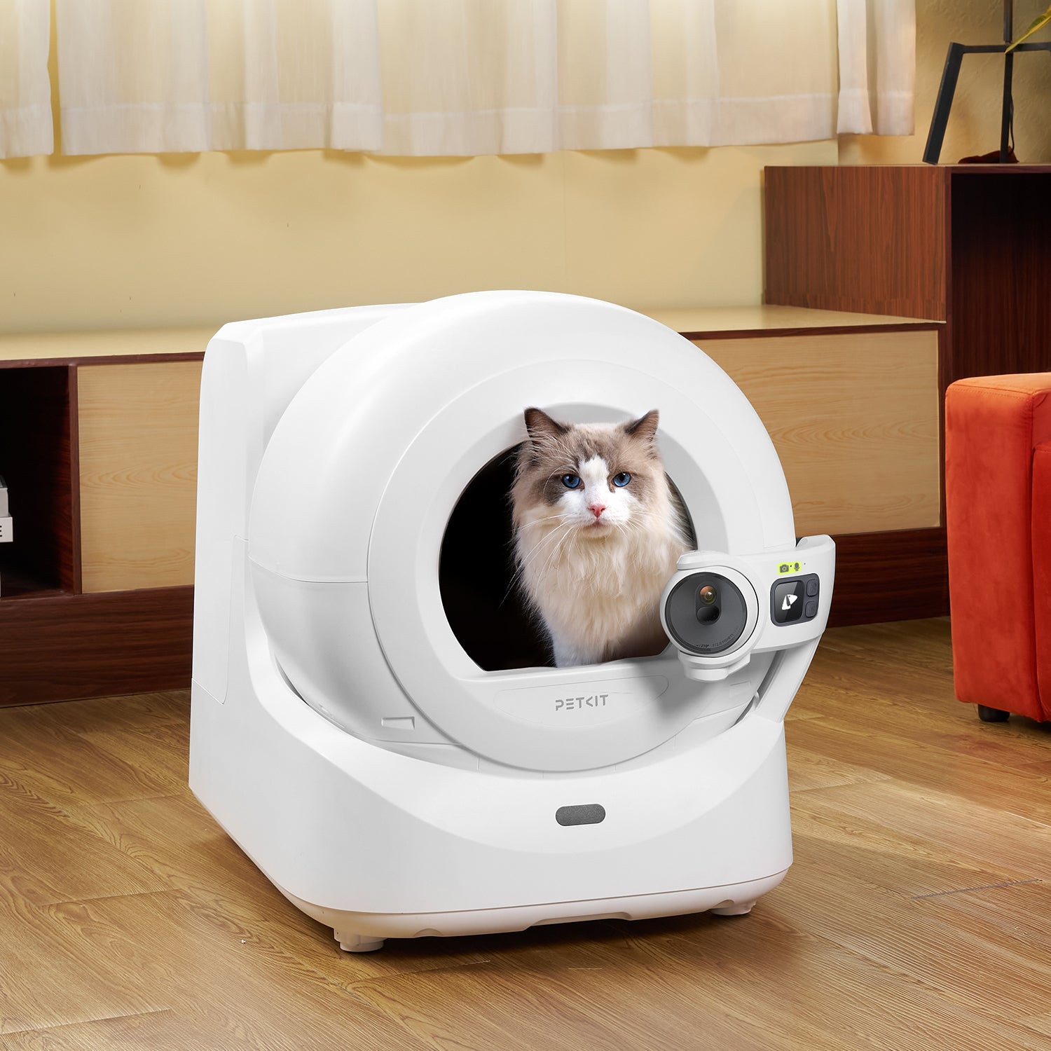 Purobot Ultra Automatic Cat Litter Box in a cozy home setting, showing a cat using the box comfortably and reinforcing a clean, stress-free environment
