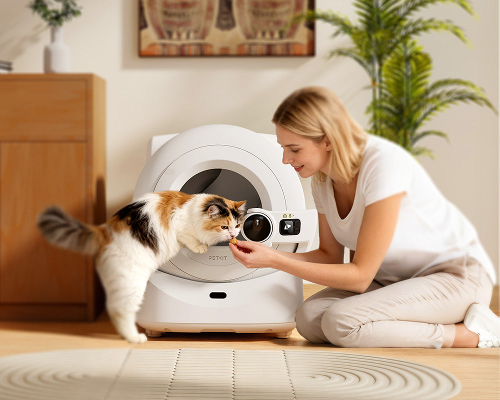 Reward your cat with treats, praise, or catnip when she explores the Purobot Ultra Automatic Litter Box using positive reinforcement to make the transition easier