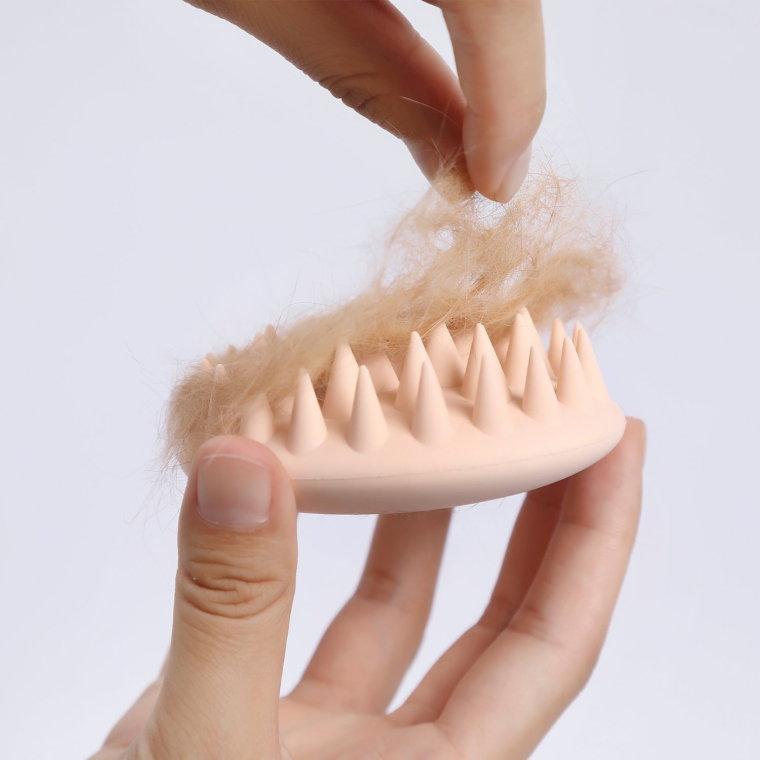 Pet Massage Comb allows loose fur to be removed easily from the silicone surface after grooming