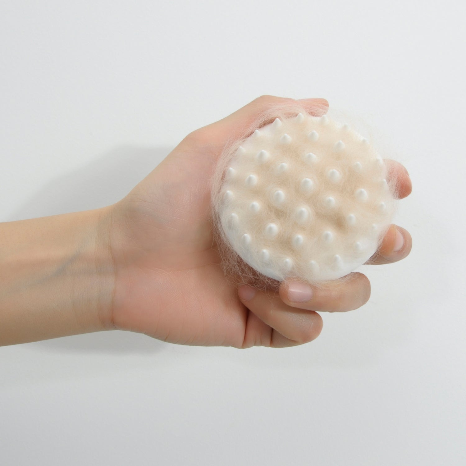 Pet Massage Comb features an ergonomic, easy-to-hold design with a compact size of 3.11 × 3.11 × 1.42 inches, suitable for all cats and small dogs