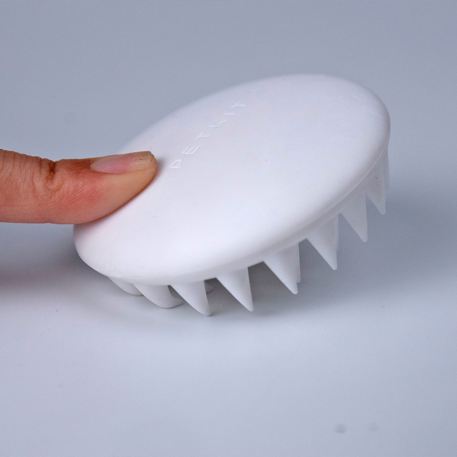 Pet Massage Comb made with premium silicone that is durable, waterproof, and gentle on pet skin