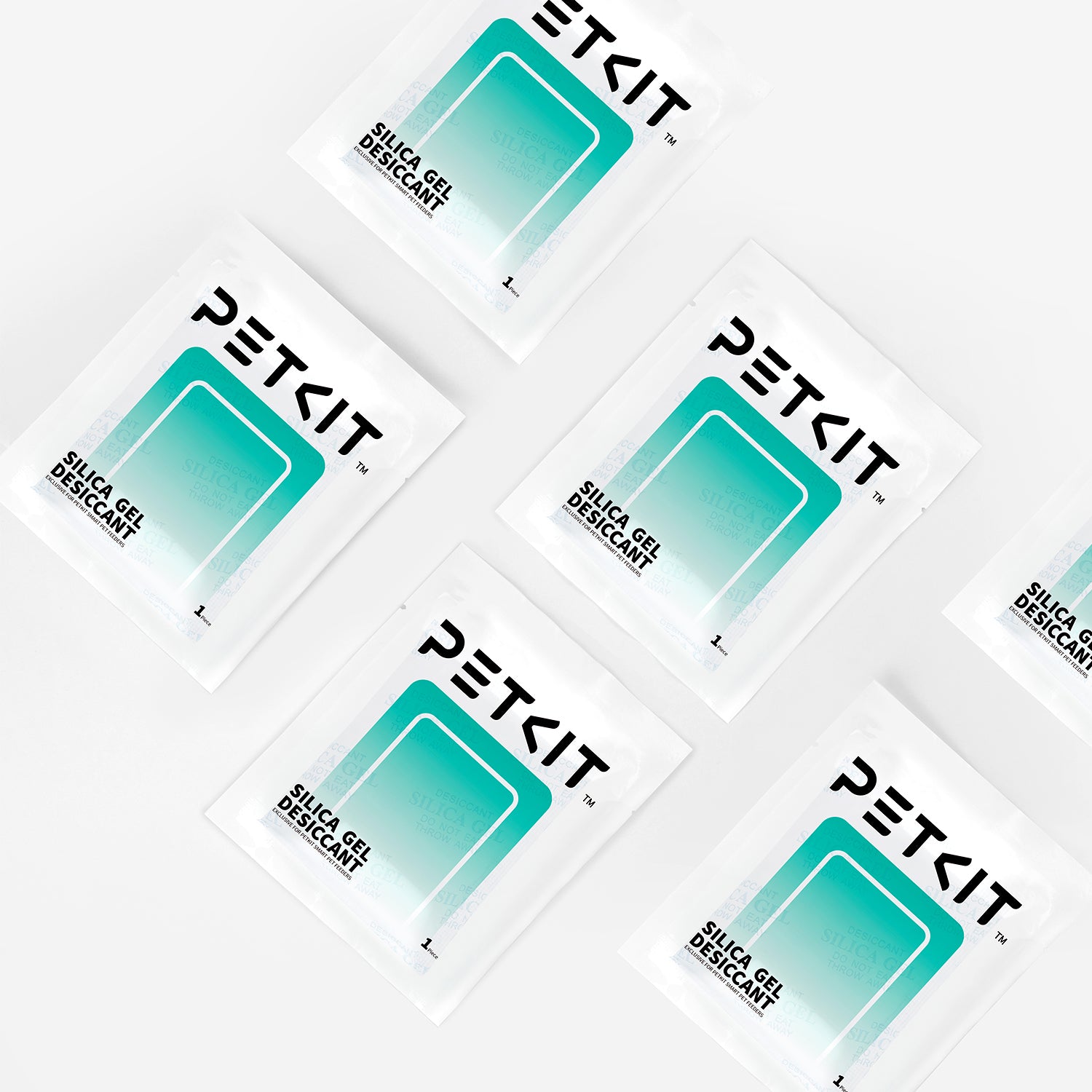 Multiple PETKIT desiccant packs demonstrating convenient quantity for long-lasting freshness